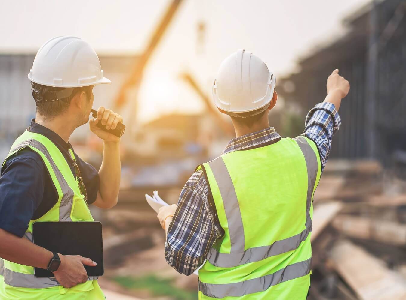 Construction managers reviewing work at a jobsite