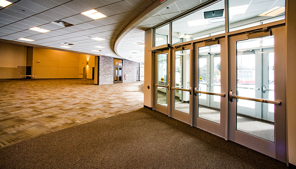 Crosspoint Baptist Church entry lobby with glass doors and open gathering space