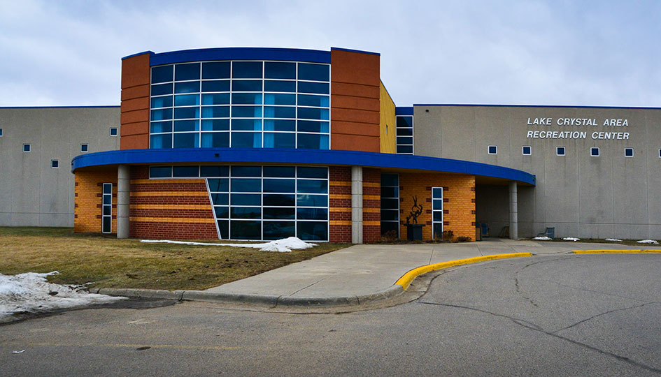 Lake Crystal Area Recreation Center exterior with curved glass entrance