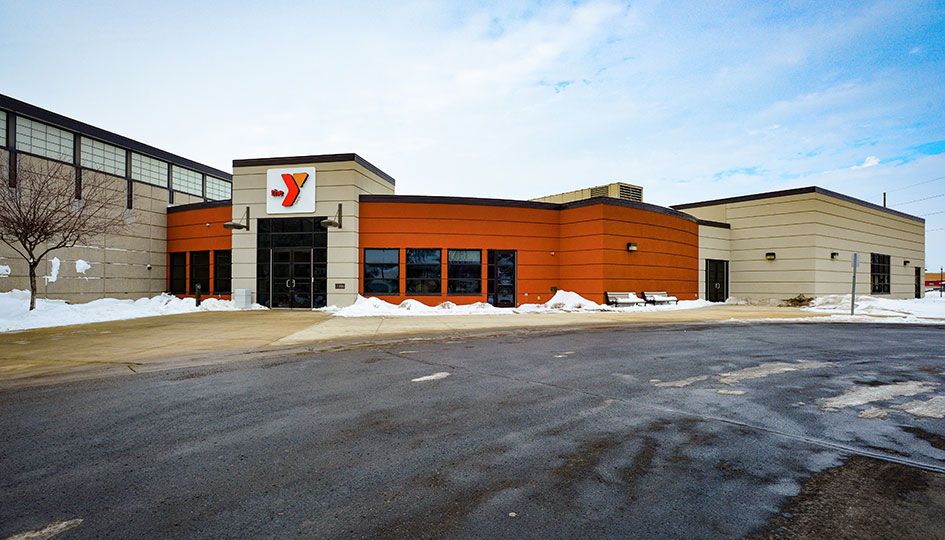 Marshall YMCA exterior with front entrance and snowy parking lot