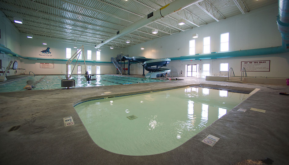 Unity Square indoor pool with waterslide and shallow recreation area